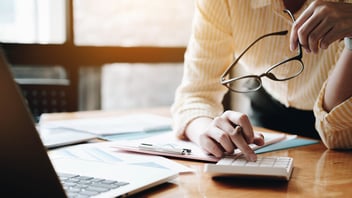 Woman on laptop personal finance